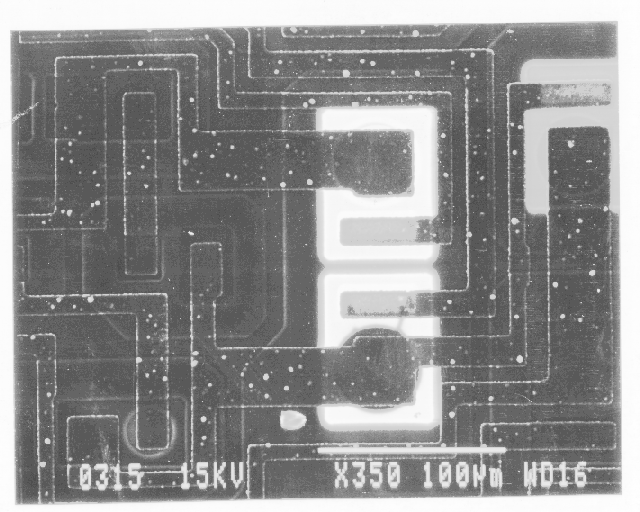 EBIC image showing ESD damage on the lower transistor: emitter-base short. (photo coutresy Analytical Solutions).