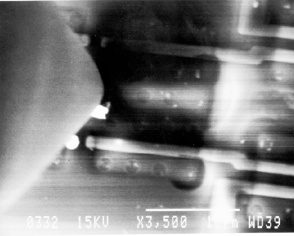 EBIC image (noisy) showing location of a gate oxide defect on a different IC. (photo coutresy Analytical Solutions).