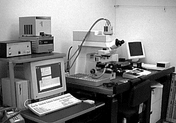 Typical hardware setup used for Fluorescent Microthermographic imaging. (Photo courtesy Sandia Labs.).