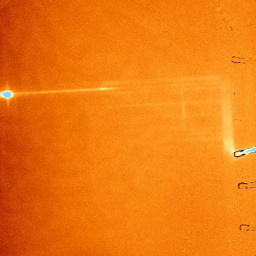 FMI image (100X) of heat dissapation in a 256k SRAM from a 5.9 ohm short caused by a metal 1 patterning defect. Image shows the heat generated from the short as well as current flow in the metal 3 conductors. (Photo courtesy Sandia Labs.).