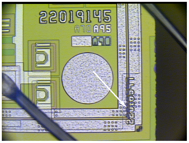 Photograph of incorrect placement of markings, resulting in a short. (Photo courtesy Sandia Labs.)