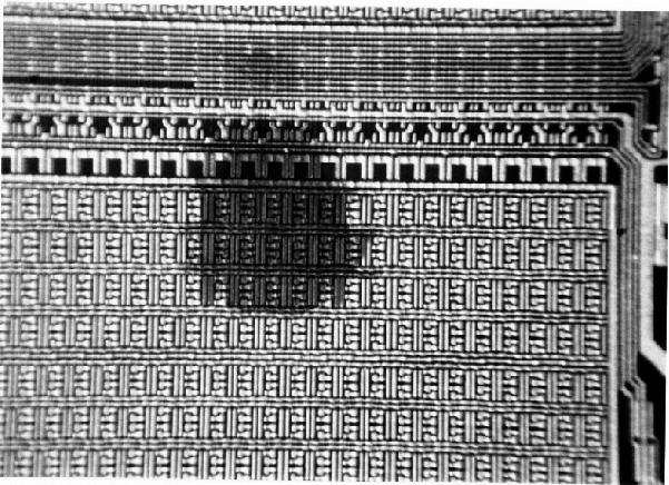 Photograph of an inked die (fails testing at electrical sort. (Photo courtesy Sandia Labs.)