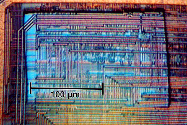 Photograph shows a 100 x 200 mm cut made in polyimide using a 50 x 50 mm aperature scanned across the die while the laser was in a pulse cutting mode (355 nm, < 15% max. power, 20 Hz, 50x near UV objective lens). (Courtesy New Wave Research).