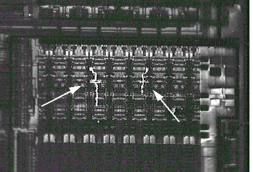 Combined CIVA and secondary electron image at about the same field of view as Fig. 3 confirming that the LIVA signal is associated with open conductors. (Courtesy Sandia Labs).