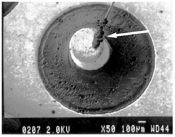 SEM image of contamination on a bond wire in an operational amplifier. (Courtesy DM Data).