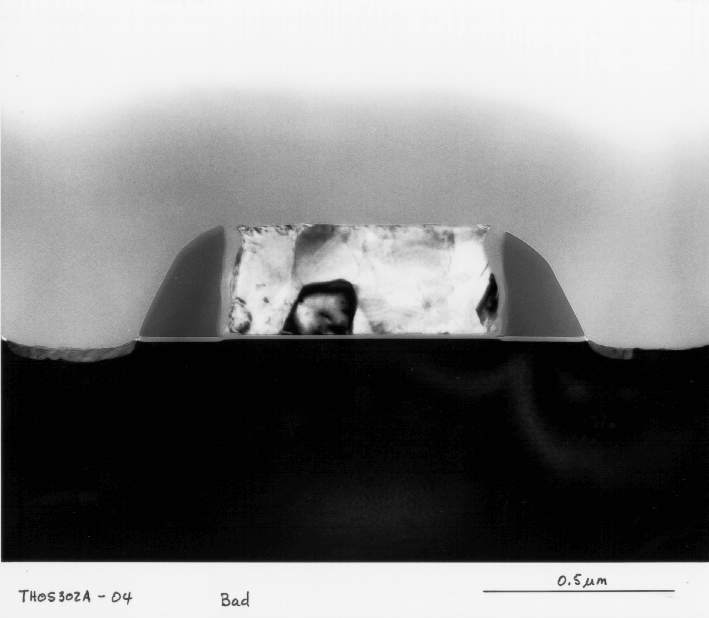 Higher magnification view of insufficient salicide formation on polysilicon lines shown in Figure 14.