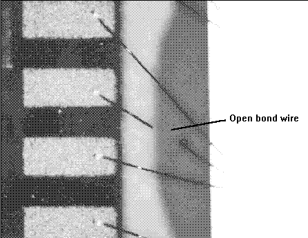 Photograph of open bond wires. (Photo courtesy Sandia Labs).